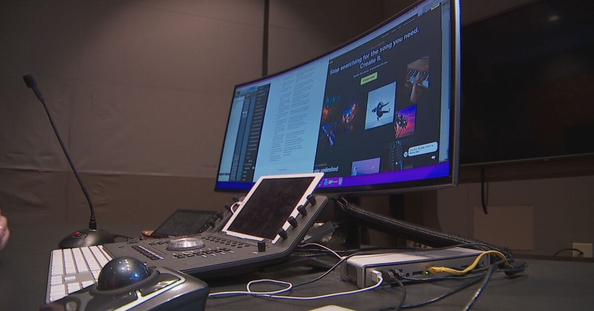 A control surface and monitor showing an AI music generation tool, from the NewsChannel 5 story