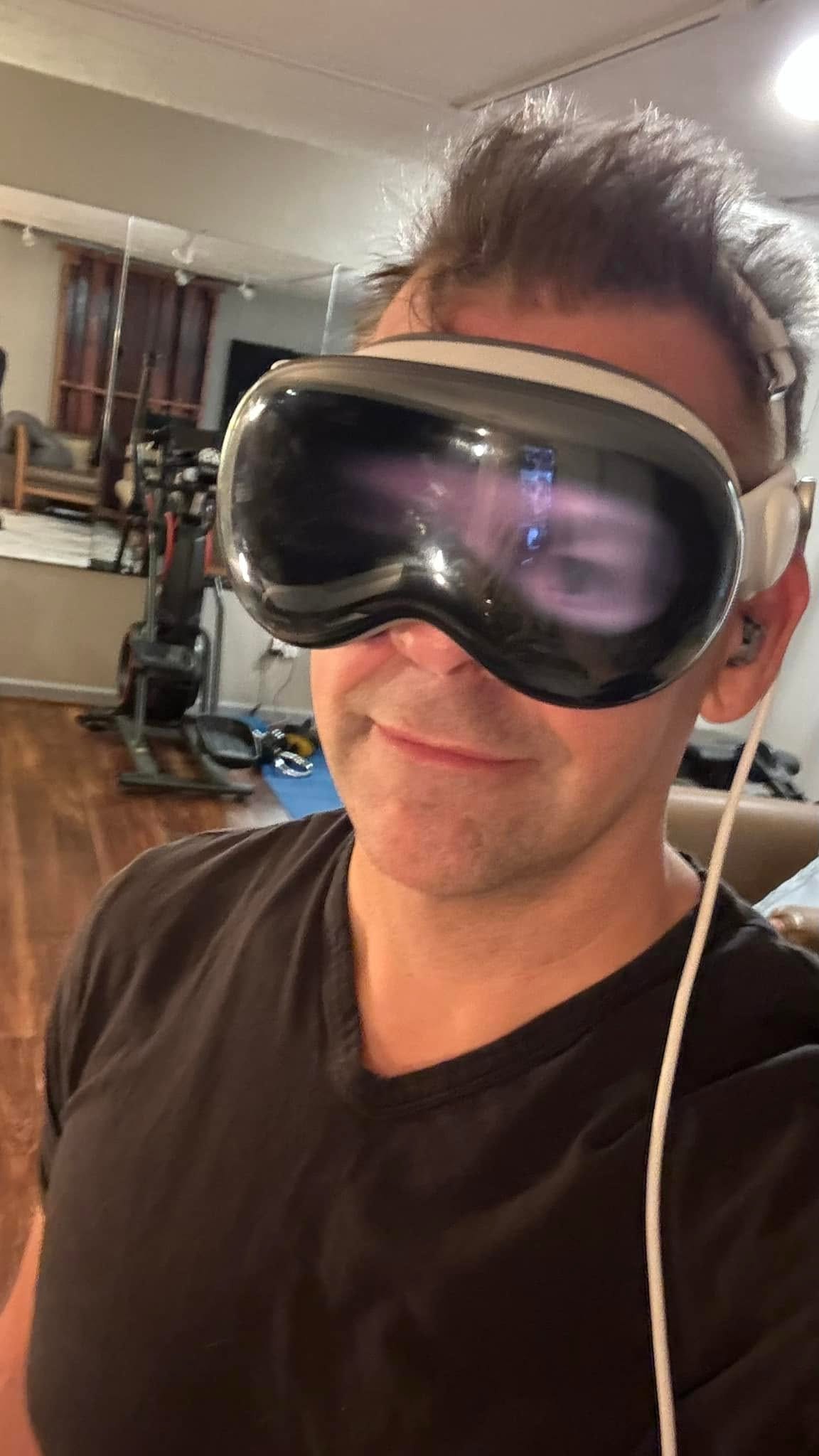 Nathan Adam wearing an Apple Vision Pro headset