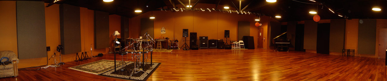 A wide panoramic view of the live room at The Walnut House